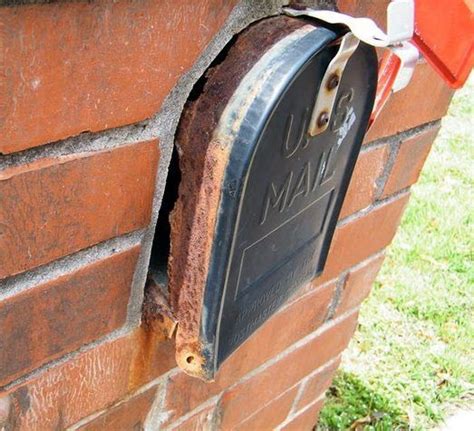 how to remove metal mailbox from brick enclosure|replacing mailbox door on brick.